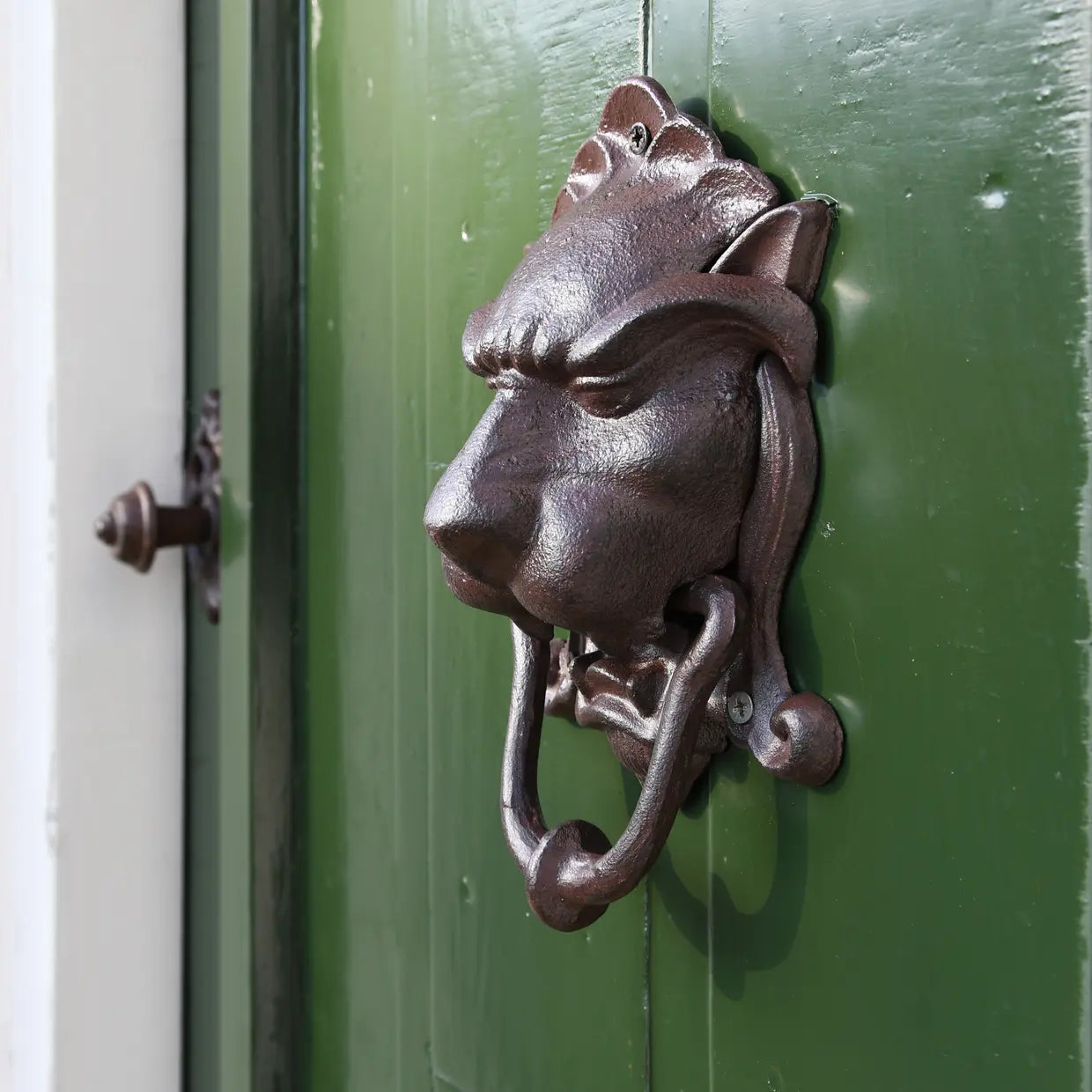 Dørbanker Støpejern, Løvehode