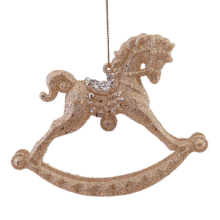 hengende hest dekorert med gull glitter