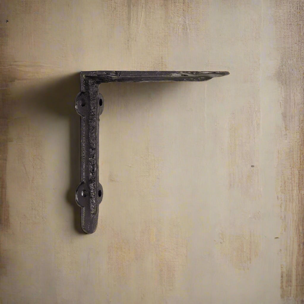 antikk gammeldags hylleknekt hylle jern støpejern brun