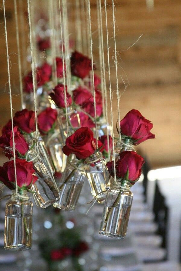 apoterkerglass liten glassflaske vase blomster