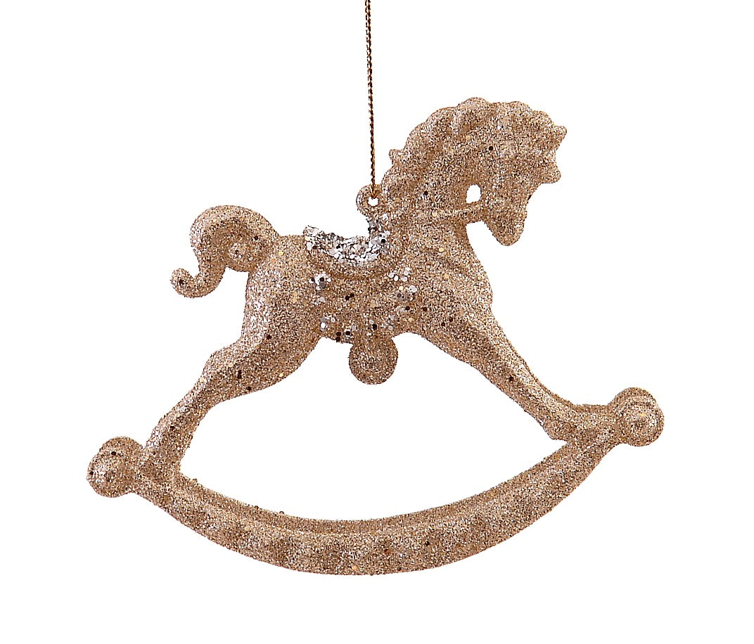 hengende hest dekorert med gull glitter 