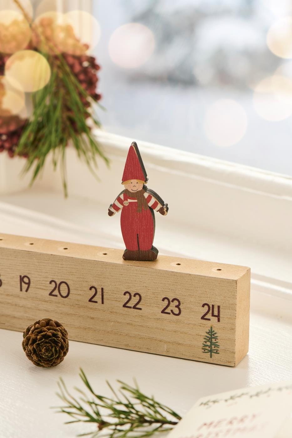 julekalender adventskalender - nisse går et steg hver dag