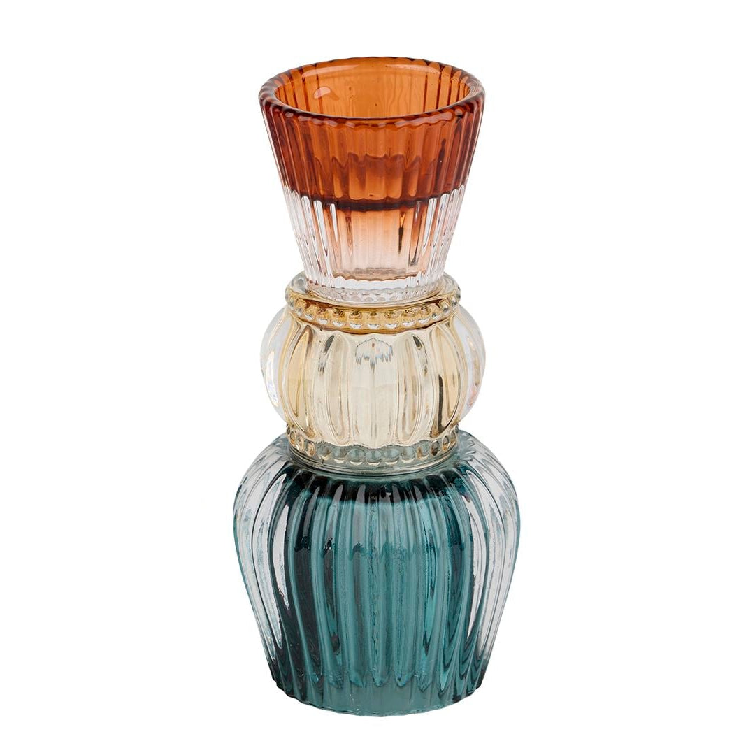 lysestake laget i farget oransje glass