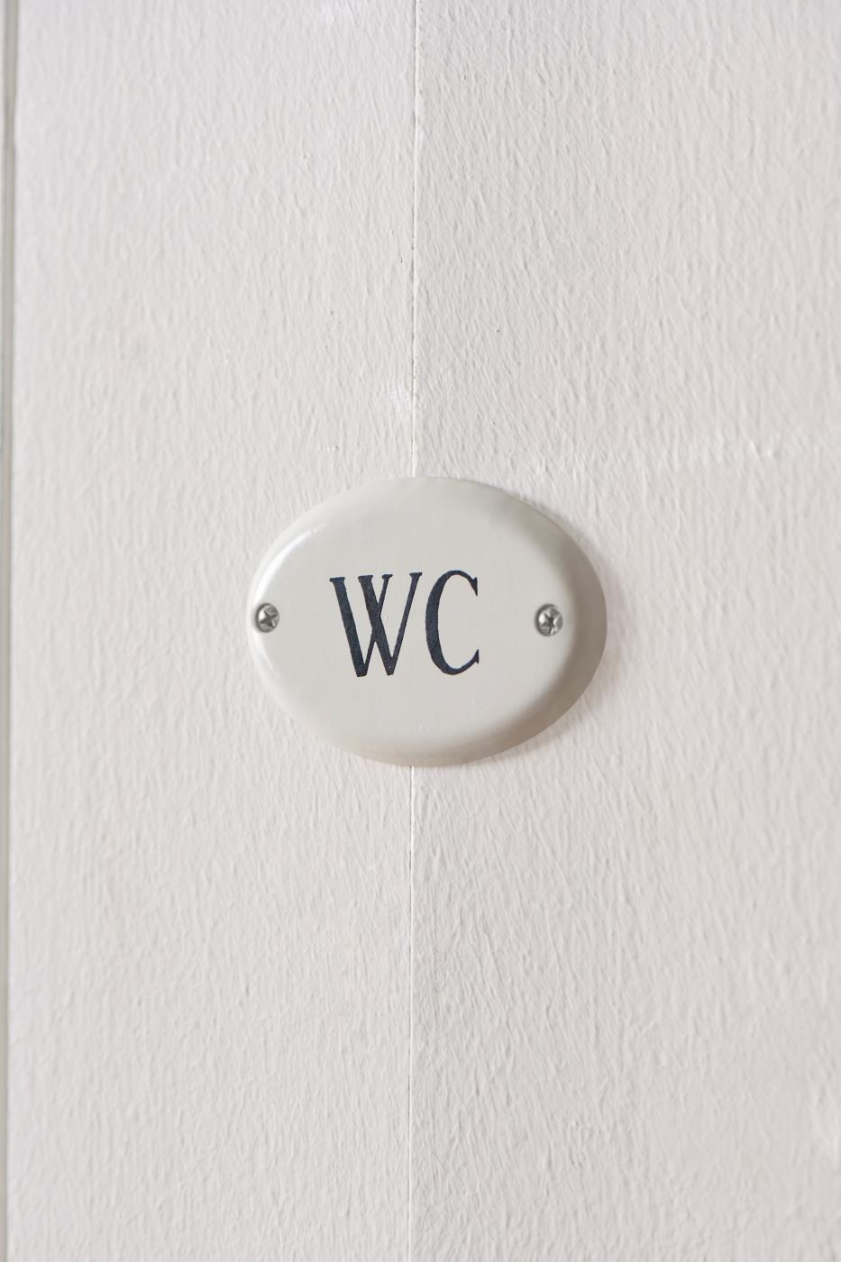 ovalt skilt til wc toalett 70102-11